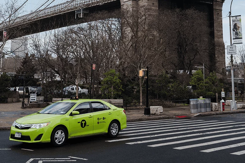 Green Cab in New York City Road...